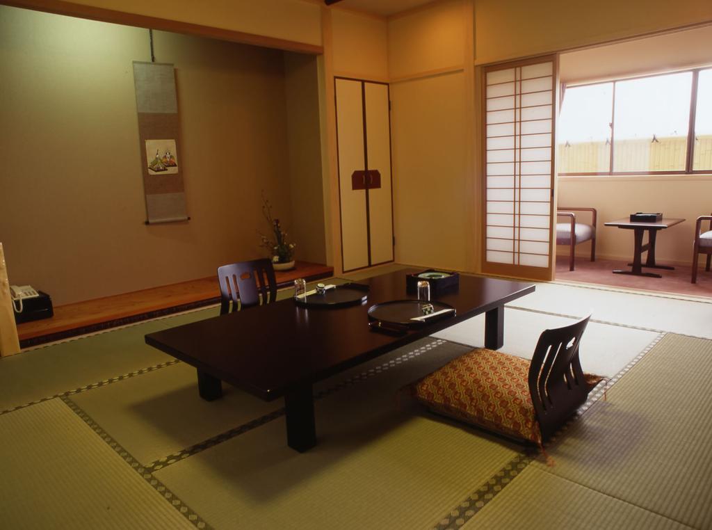 Hitomaru Kadan Hotel Акаши Стая снимка